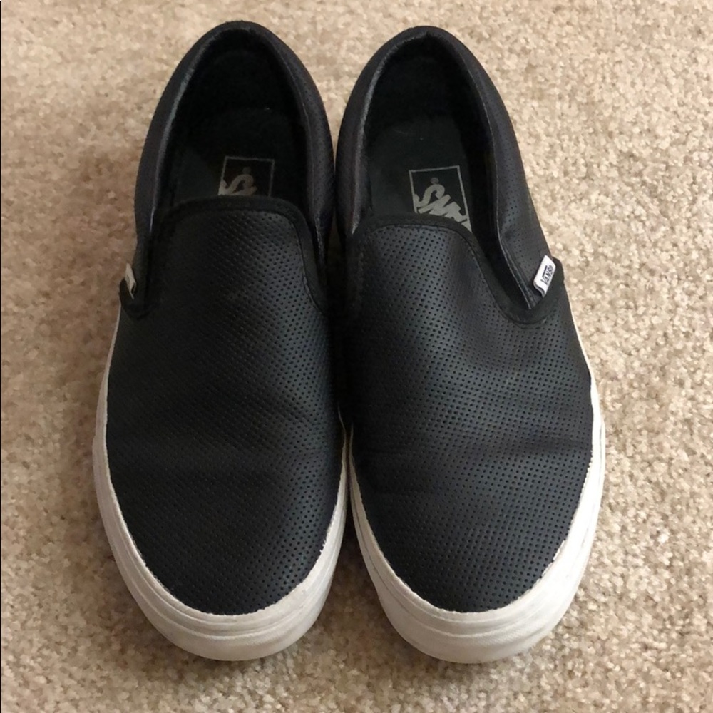Black perforated slip on vans